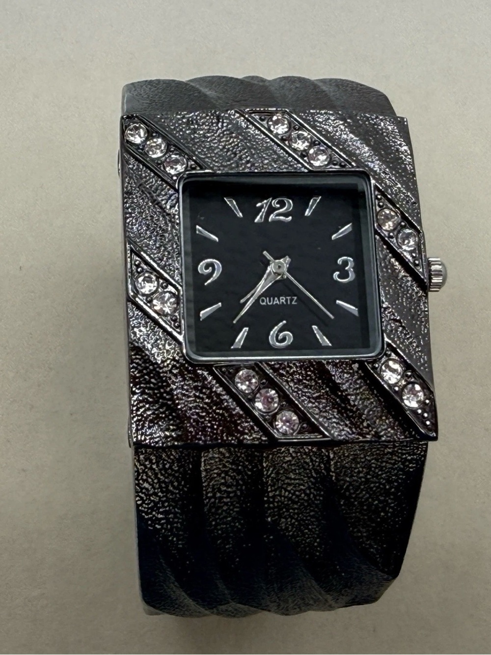 Ladies Black Tone Quartz Cuff Watch With Rhinestone Accents